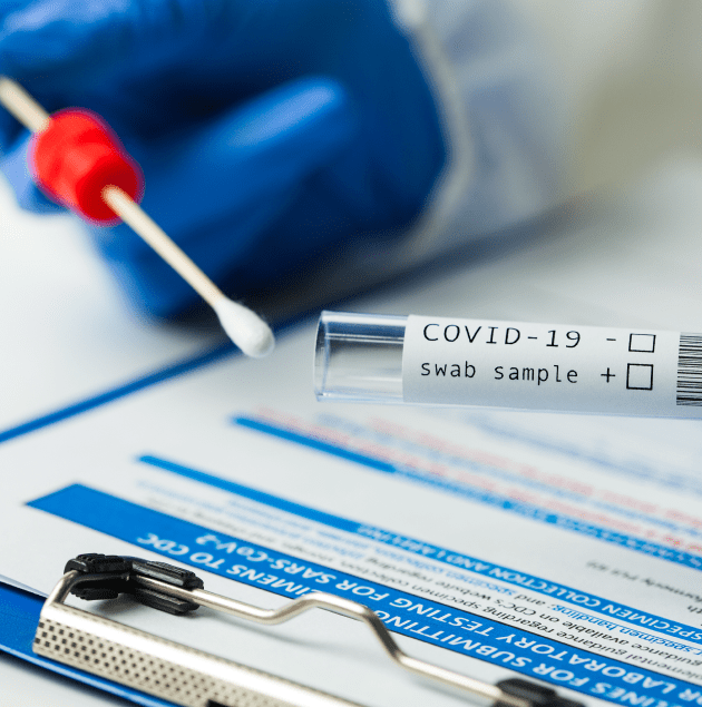 Clinician performing a rapid COVID-19 test swab at Elon Health Urgent Care in Davenport, FL