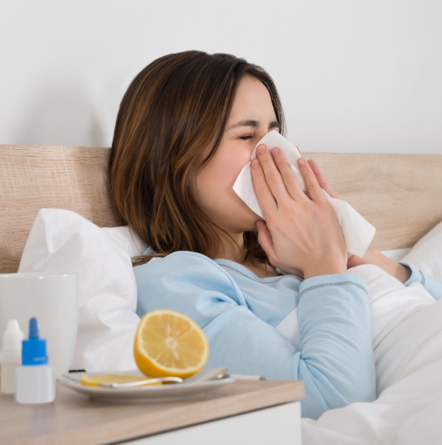 Patient receiving flu and cold symptom treatment at Elon Health Urgent Care in Davenport, FL