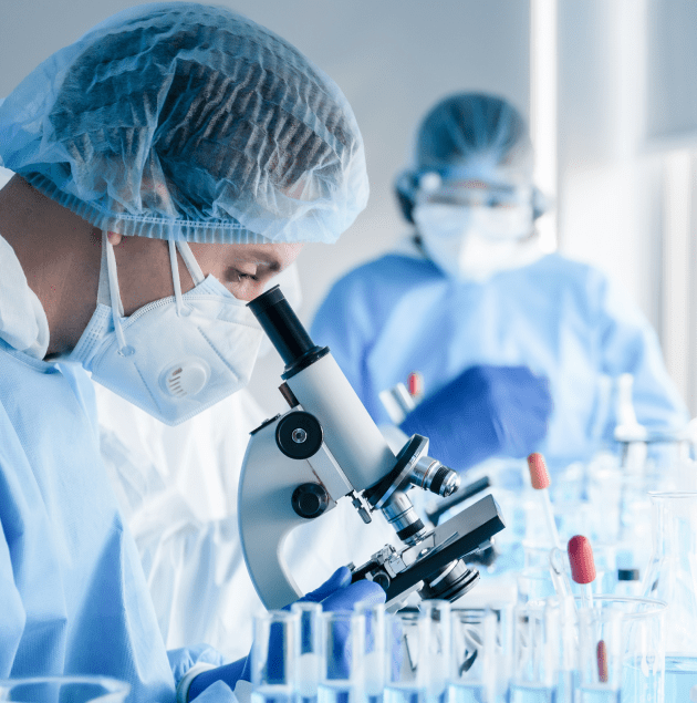 Lab technician processing samples for testing and screenings at Elon Health Urgent Care in Davenport, FL