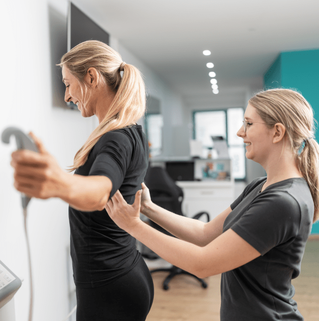 Provider completing a routine physical exam at Elon Health Urgent Care in Davenport, FL